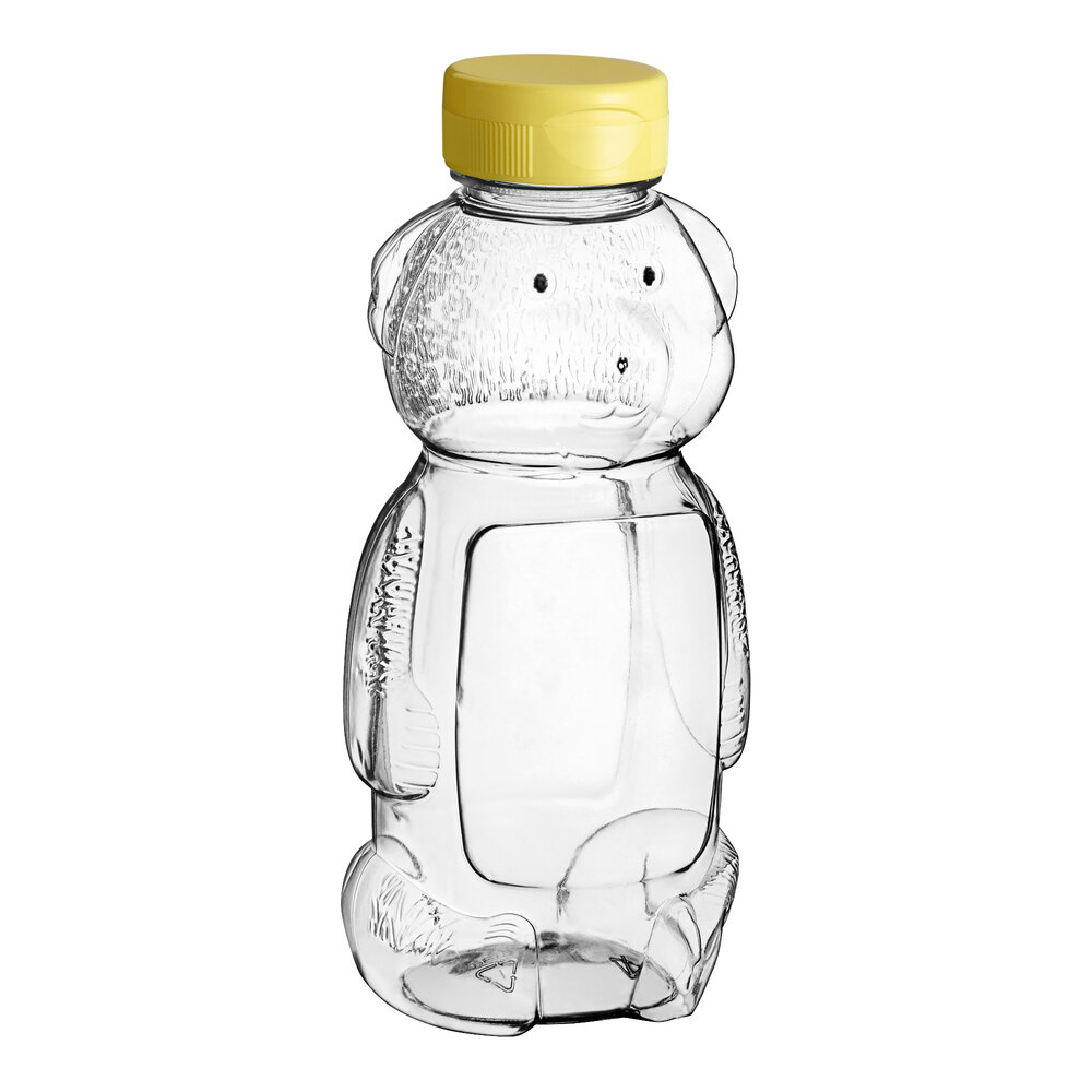16 oz. (24 oz. Honey Weight) Bear PET Honey Bottle with Heat Induction Seal Liner Yellow Plastic Flip Top Lid - 185/Case
