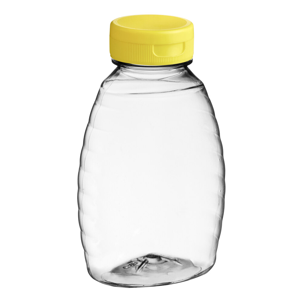 8 oz. (12 oz. Honey Weight) Classic Queenline PET Honey Bottle with Pressure Sensitive Liner Yellow Plastic Flip Top Lid - 385/Case