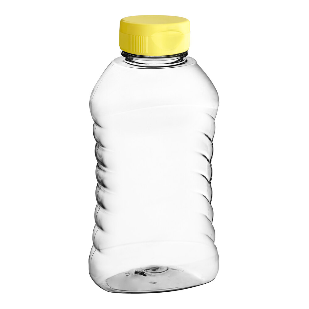 11 oz. (16 oz. Honey Weight) Ribbed Hourglass PET Honey Bottle with Heat Induction Seal Liner Yellow Plastic Flip Top Lid - 295/Case