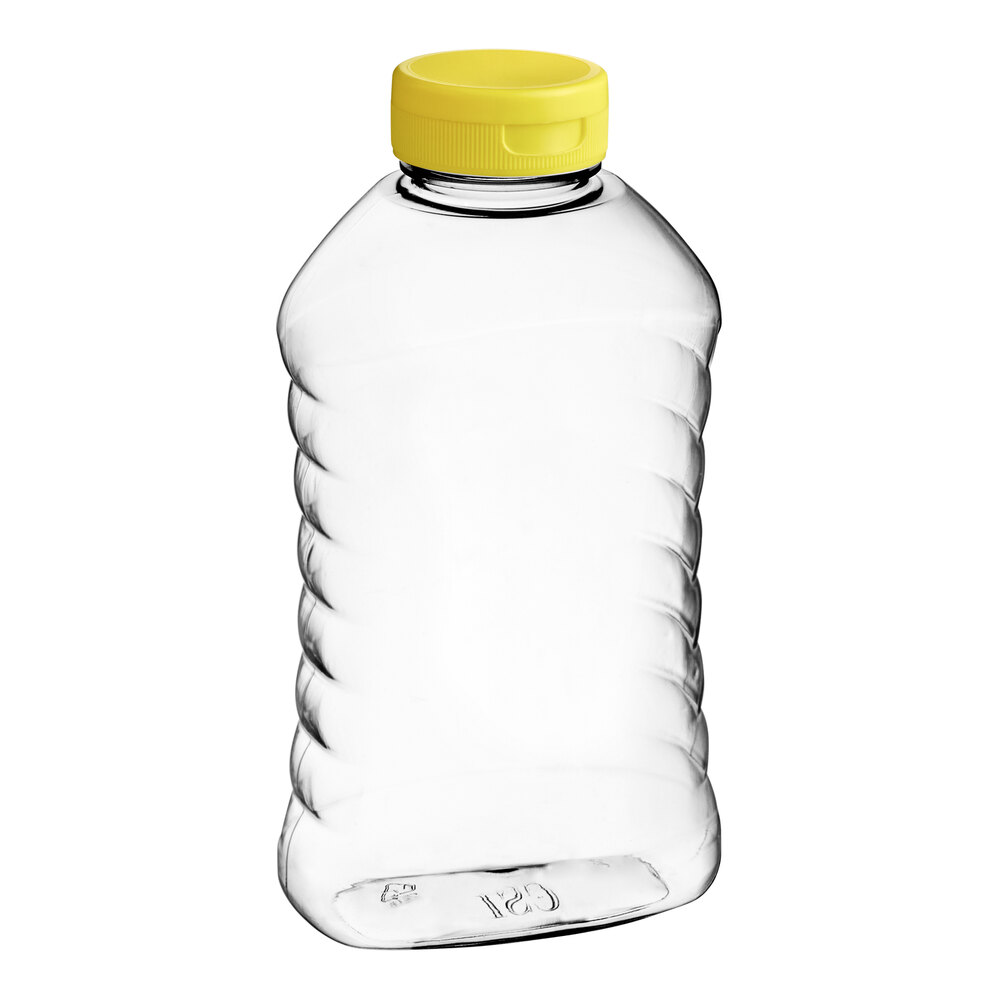 16 oz. (24 oz. Honey Weight) Ribbed Hourglass PET Honey Bottle with Pressure Sensitive Liner Yellow Plastic Flip Top Lid - 190/Case