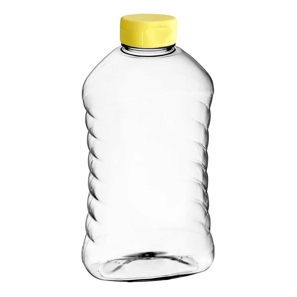 22 oz. (32 oz. Honey Weight) Ribbed Hourglass PET Honey Bottle with Heat Induction Seal Liner Yellow Plastic Flip Top Lid - 159/Case